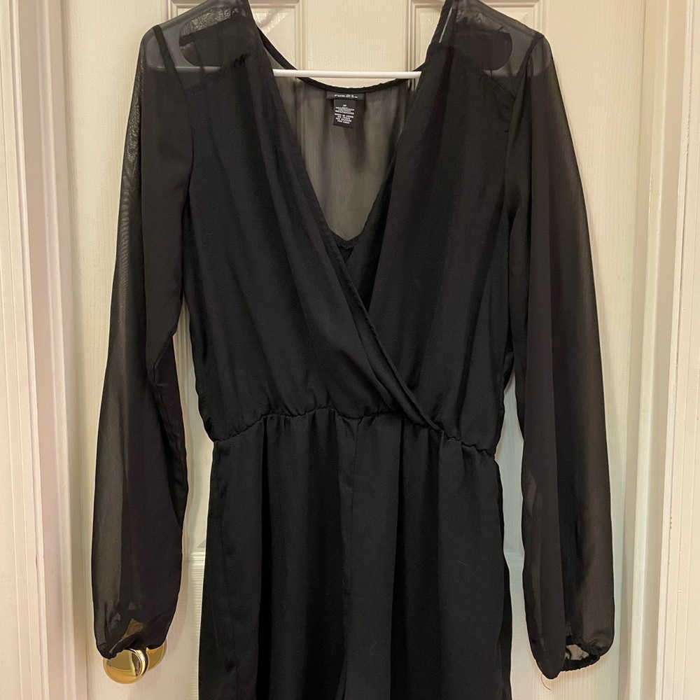 Rue 21 black shorts romper. Sheer(long) sleeves and upper chest/back.